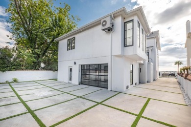 This remarkable contemporary residence on prestigious Murray