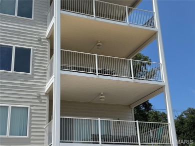 This one is ALL ABOUT THE VIEW !!!  This 2nd floor end unit has