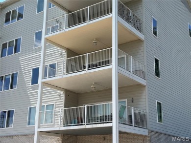 This one is ALL ABOUT THE VIEW !!!  This 2nd floor end unit has