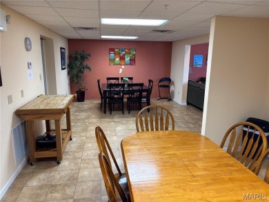 This one is ALL ABOUT THE VIEW !!!  This 2nd floor end unit has