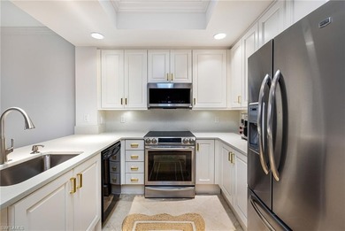 Set high above the treetops, this impressive 2nd-floor condo