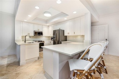 Set high above the treetops, this impressive 2nd-floor condo