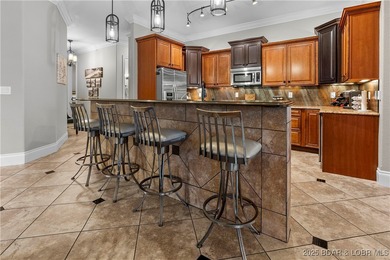 Welcome to Unit 415 at The Hamptons, a premier high-end