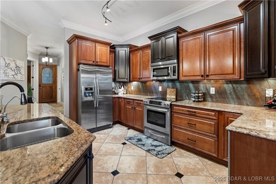 Welcome to Unit 415 at The Hamptons, a premier high-end