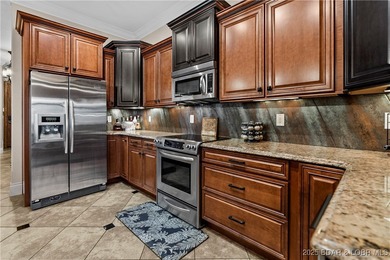 Welcome to Unit 415 at The Hamptons, a premier high-end