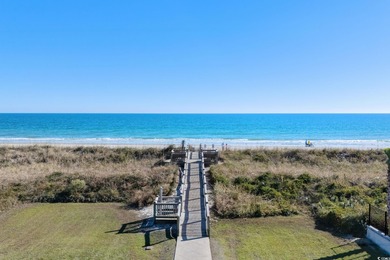 Experience the epitome of coastal luxury with this stunning