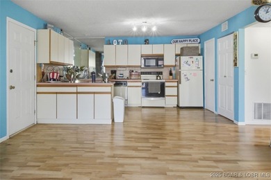 Experience the ultimate Lake of the Ozarks escape in this highly