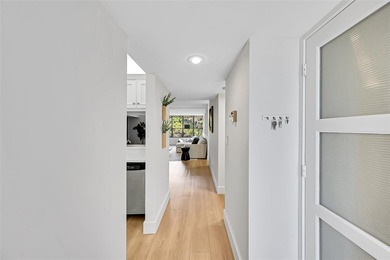 Discover luxury in this stunning ALL AGES  2nd-floor condo with