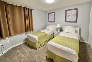 Updated two-bedroom, two-bath condo with great lake views in