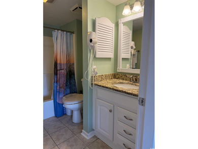 Updated two-bedroom, two-bath condo with great lake views in