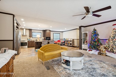 Discover this inviting 2022-built home set on nearly 2 acres of