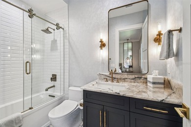 Ideally positioned on a picturesque, sidewalk-lined street in