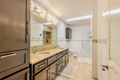 Welcome to this beautifully renovated Courtyard Townhome