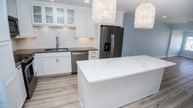 ***Fully Renovated Waterfront Condo - Harbor Villas Wake up to