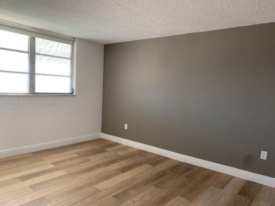 PRICE IMPROVED! Fantastic opportunity! TOP Floor 1/1.5 condo