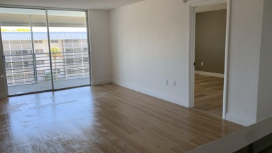 PRICE IMPROVED! Fantastic opportunity! TOP Floor 1/1.5 condo