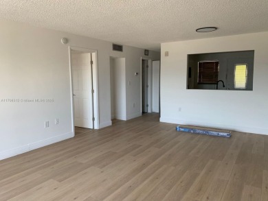 PRICE IMPROVED! Fantastic opportunity! TOP Floor 1/1.5 condo