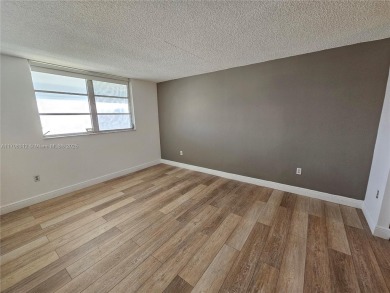 PRICE IMPROVED! Fantastic opportunity! TOP Floor 1/1.5 condo