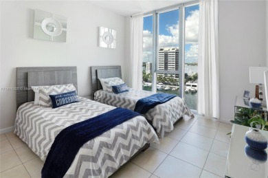 Elegant 2BD/2BA at 7928 East Dr with beautiful city + bay views