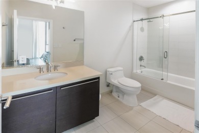 Elegant 2BD/2BA at 7928 East Dr with beautiful city + bay views