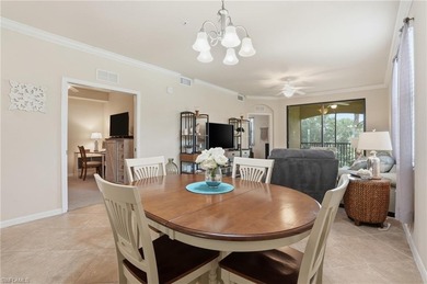 This rarely available second-floor end unit in Bonita National