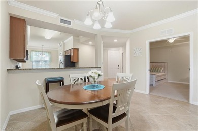 This rarely available second-floor end unit in Bonita National