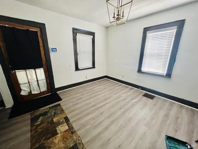 Freshly redone home setting on a double lot! Main floor suite