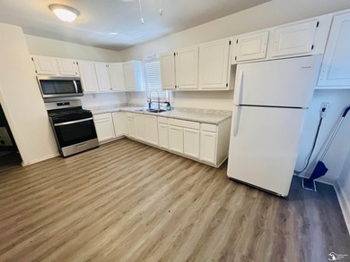 Freshly redone home setting on a double lot! Main floor suite