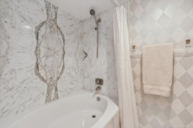 Experience coastal luxury living in this beautifully appointed