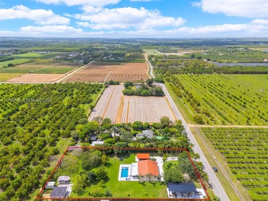 POOL HOME LOADED WITH FRUIT TREES ON 1+ ACRE SHE IS A 3/2  IN