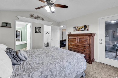 Spacious third-floor two-bedroom, two-bath condo located in an