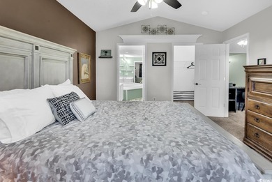 Spacious third-floor two-bedroom, two-bath condo located in an