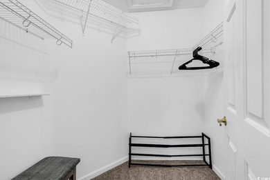 Spacious third-floor two-bedroom, two-bath condo located in an