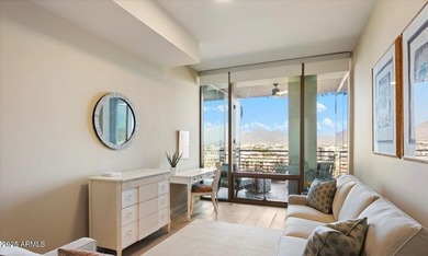 Step inside this beautiful 10th-floor penthouse at Optima