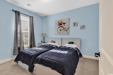 Welcome to this beautifully maintained two-bedroom, two-bath