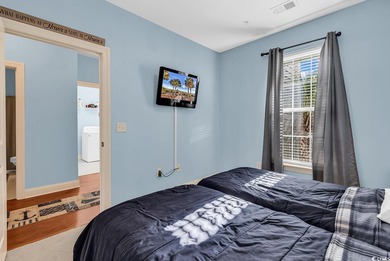 Welcome to this beautifully maintained two-bedroom, two-bath