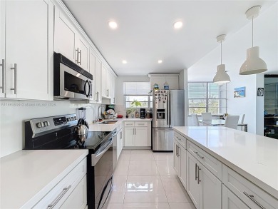 Welcome to this beautifully maintained third-floor condo in the