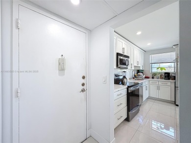 Welcome to this beautifully maintained third-floor condo in the