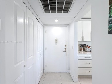 Welcome to this beautifully maintained third-floor condo in the