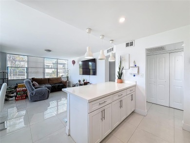 Welcome to this beautifully maintained third-floor condo in the