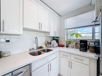 Welcome to this beautifully maintained third-floor condo in the