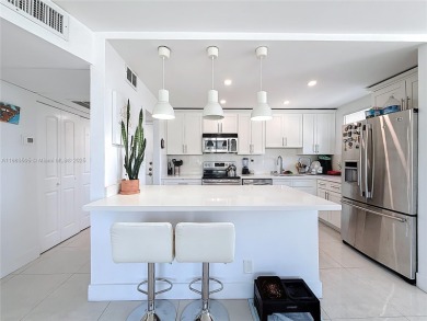 Welcome to this beautifully maintained third-floor condo in the