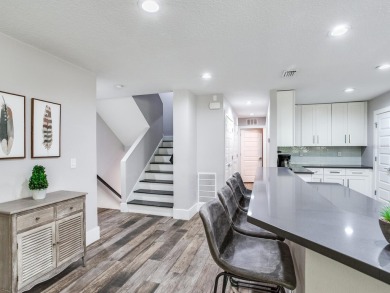 High and Dry! Elevated townhome, no living space on ground level