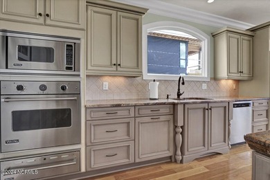 Located on the south end of Figure Eight Island, this stunning