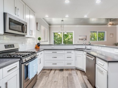 High and Dry! Elevated townhome, no living space on ground level