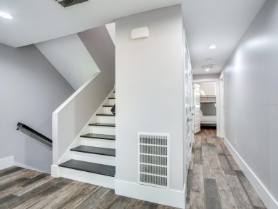 High and Dry! Elevated townhome, no living space on ground level