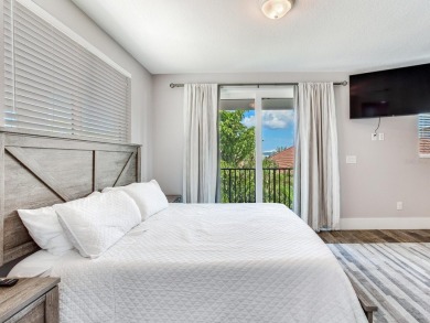 High and Dry! Elevated townhome, no living space on ground level