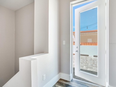 High and Dry! Elevated townhome, no living space on ground level