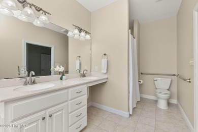 This stunning home is located in the highly desirable gated