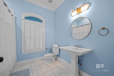 Stunning canal-front home on highly sought after Ono Island!